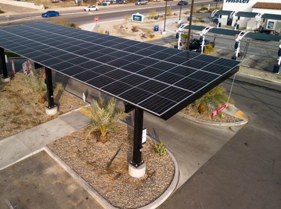 Solar canopy structure covering a commercial parking area
